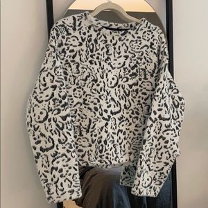 White and black leopard print sweater